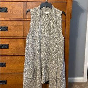 Long sleeveless sweater